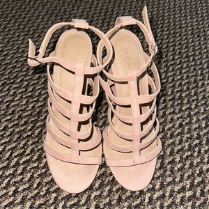 Suede nude colored heels.